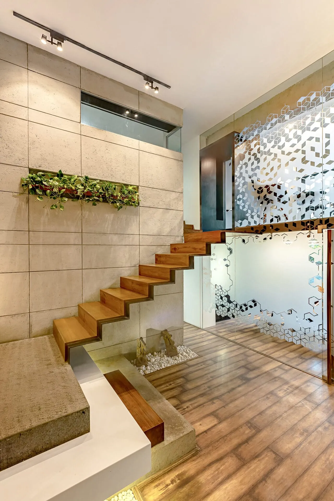 Get inspired by Legend Siroya's modern office space with stunning wood features, plant walls, and intricate glass designs | AVN Interiors